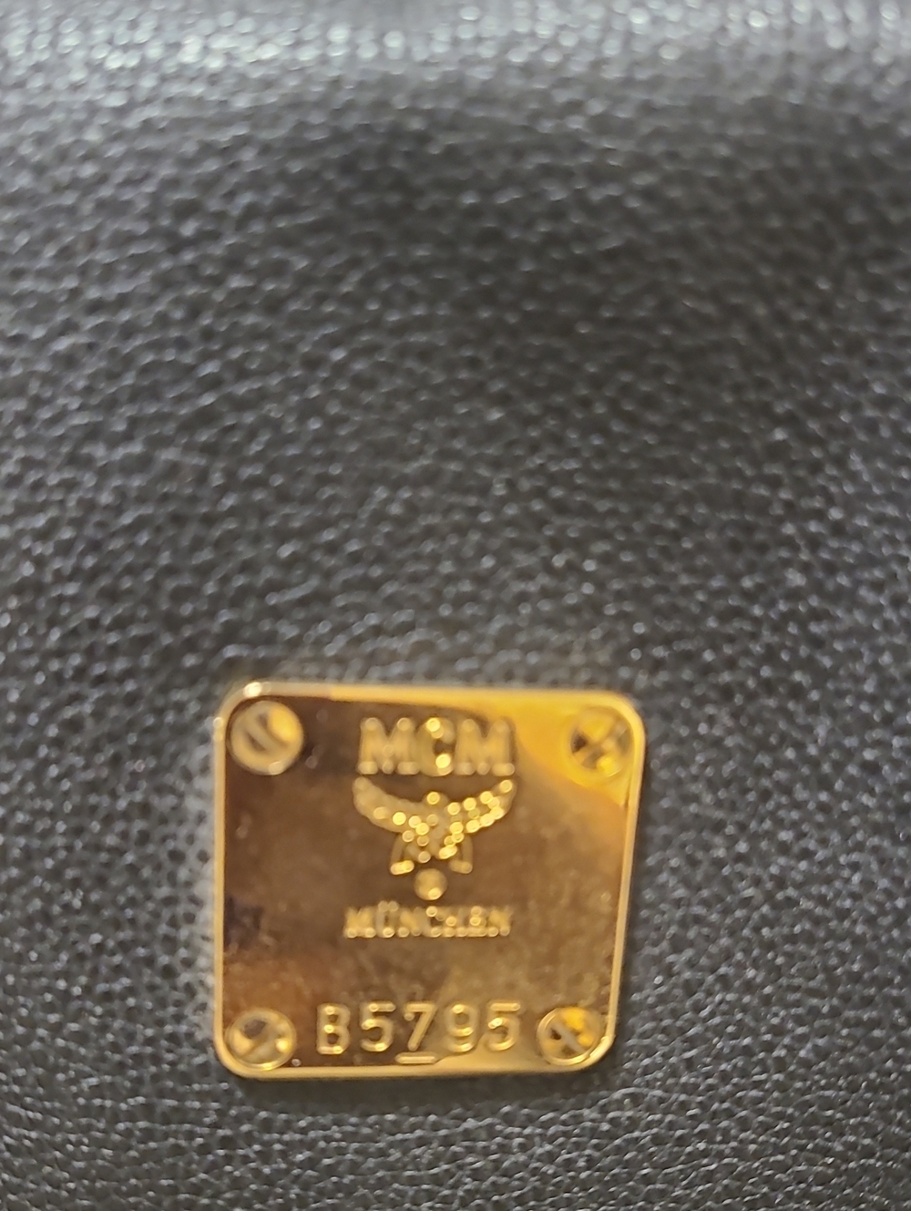 MCM Black Leather Bag with Gold Logo Plate